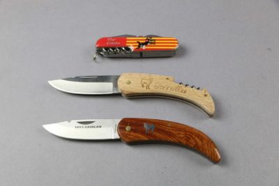 three different types of knives on the table