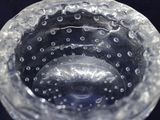 a close up of a clear glass with bubbles in it