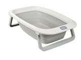 a white and gray bath tub with a handle