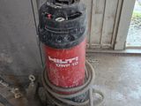a fire extinguisor sitting on top of a fire hydrant