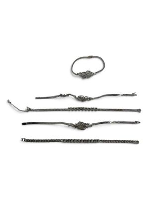 a set of three bracelets on a white background