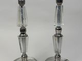 pair of silver plated candlesticks with clear glass bases