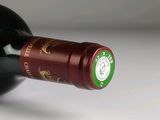 a bottle of wine that is sitting on a table
