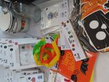 a table with a bunch of halloween themed items on it