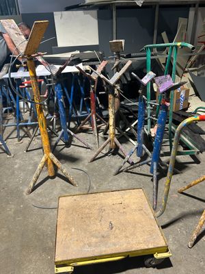 a lot of tools that are sitting on the floor
