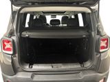the back end of a car with the trunk open and the back seats down