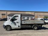 a white truck that is parked in a parking lot