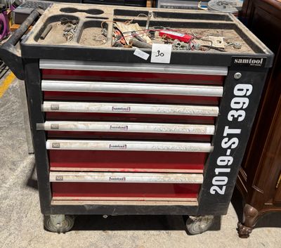 a lot of tools on a cart in the store