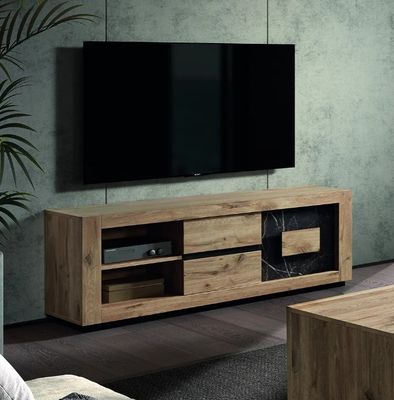 un grand téléviseur posé sur un meuble dans un salon