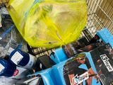 a shopping cart filled with assorted items in a store