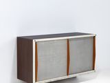 the sideboard is made of wood and has a metal frame