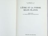 an open book with a black and white title on it