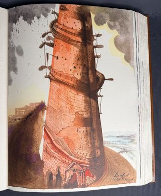 un livre ouvert sur lequel figure l'image d'un phare