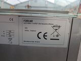 a close up of a sign on the side of a dishwasher