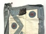 a bag that has a blue and white design on it
