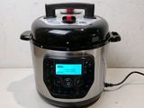 an image of a digital pressure cooker on a counter