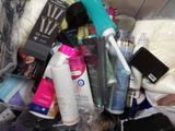 a close up of a plastic container filled with personal care items