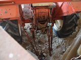 a tractor that is sitting in the dirt