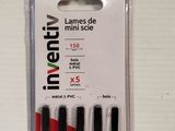 three black and red pens sitting in a package on a table