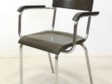 an image of a black leather chair with chrome legs