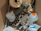 a cardboard box filled with assorted items and items