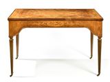 a small table with a wooden top on a white background