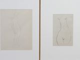 deux dessins encadrés représentant une femme et un homme debout l'un à côté de l'autre