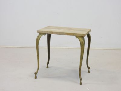 an image of a small table with a wooden top on a white floor