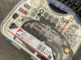 a tool kit in a plastic container on the floor