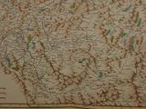 an old map of a country with a lot of mountains in the background