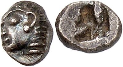 a silver coin with an image of a man on it