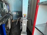 an image of a truck that is parked in a storage area
