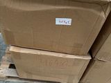 a stack of boxes sitting on a pallet in a warehouse