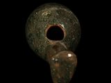 an image of a close up of a metal object on a black background