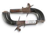 pair of old guns on a white background with a price tag