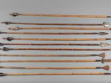 six different types of arrows are arranged on a gray surface