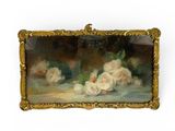 painting of flowers in a gold frame on a white surface