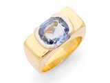une bague en or 18 carats sertie d'une topaze bleue