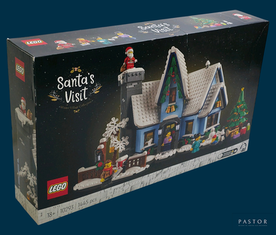 une boîte contenant une maison de Noël en Lego
