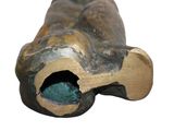a close up of a metal object with a hole in it