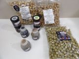 a bag of olives and other spices on a table