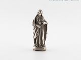 the statue of a woman holding a baby is shown on a white surface