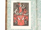 an old book with a picture of a knight on it