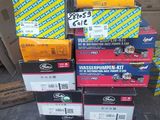 several boxes of assorted electrical equipment are stacked on top of each other