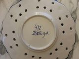 a plate with a name on it sitting on a table
