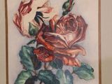 a picture of a painting of a rose on the wall