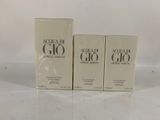 two boxes of acqua di gio cologne sitting on a table