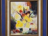 un tableau représentant des fleurs dans un vase, dans un cadre bleu