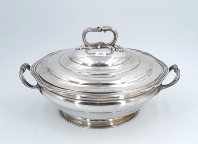 an antique silver plate covered casserole with handles and handles