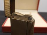 a lighter that is sitting in a box on a table